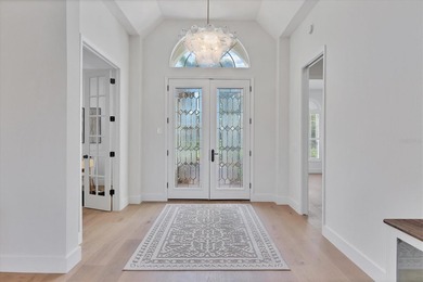 Rare found and absolutely stunning, this completely renovated on University Park Country Club in Florida - for sale on GolfHomes.com, golf home, golf lot