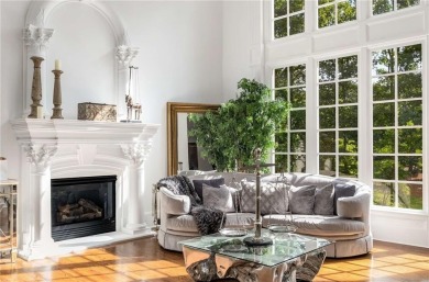 Step into timeless sophistication and grand-scale living in this on TPC At Sugarloaf Golf Club in Georgia - for sale on GolfHomes.com, golf home, golf lot