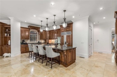 Step into timeless sophistication and grand-scale living in this on TPC At Sugarloaf Golf Club in Georgia - for sale on GolfHomes.com, golf home, golf lot