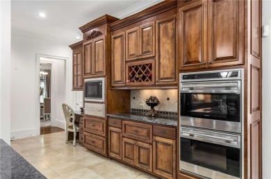 Step into timeless sophistication and grand-scale living in this on TPC At Sugarloaf Golf Club in Georgia - for sale on GolfHomes.com, golf home, golf lot