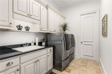 Step into timeless sophistication and grand-scale living in this on TPC At Sugarloaf Golf Club in Georgia - for sale on GolfHomes.com, golf home, golf lot