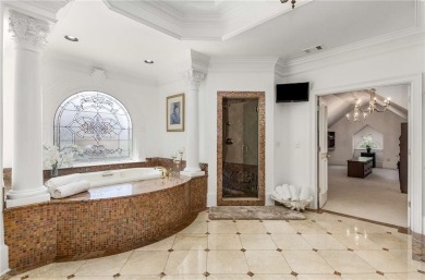 Step into timeless sophistication and grand-scale living in this on TPC At Sugarloaf Golf Club in Georgia - for sale on GolfHomes.com, golf home, golf lot