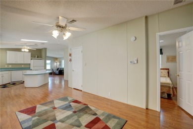 2 bed/2-bath, 1384 sf. Step inside to a welcoming Florida rm on Barefoot Bay Golf Course in Florida - for sale on GolfHomes.com, golf home, golf lot
