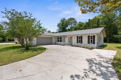 Welcome to this beautifully maintained 3-bedroom, 2-bathroom on Sugarmill Woods Golf and Country Club in Florida - for sale on GolfHomes.com, golf home, golf lot