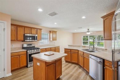 Welcome to your dream home in the stunning golf community of on Arlington Ridge Golf Club in Florida - for sale on GolfHomes.com, golf home, golf lot