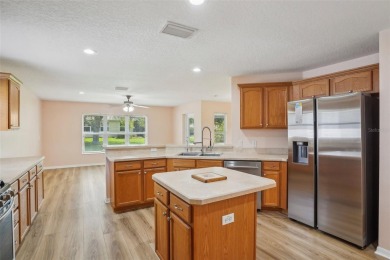 Welcome to your dream home in the stunning golf community of on Arlington Ridge Golf Club in Florida - for sale on GolfHomes.com, golf home, golf lot