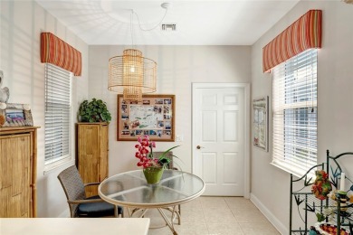 Well-maintained golf cottage offers privacy inside and out on Oak Harbor Country Club in Florida - for sale on GolfHomes.com, golf home, golf lot