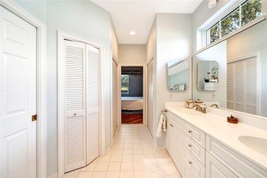 Well-maintained golf cottage offers privacy inside and out on Oak Harbor Country Club in Florida - for sale on GolfHomes.com, golf home, golf lot