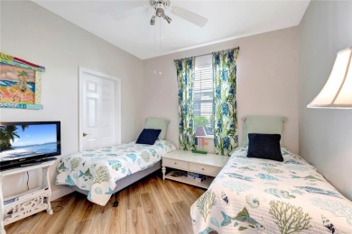 Well-maintained golf cottage offers privacy inside and out on Oak Harbor Country Club in Florida - for sale on GolfHomes.com, golf home, golf lot