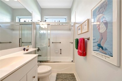 Well-maintained golf cottage offers privacy inside and out on Oak Harbor Country Club in Florida - for sale on GolfHomes.com, golf home, golf lot