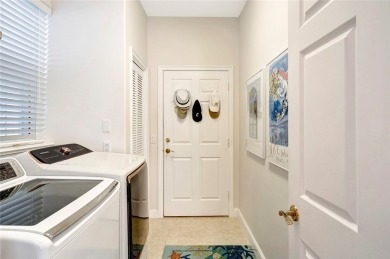 Well-maintained golf cottage offers privacy inside and out on Oak Harbor Country Club in Florida - for sale on GolfHomes.com, golf home, golf lot