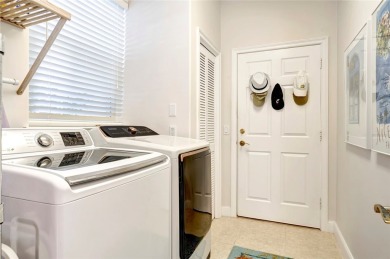 Well-maintained golf cottage offers privacy inside and out on Oak Harbor Country Club in Florida - for sale on GolfHomes.com, golf home, golf lot