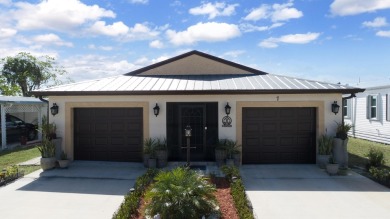 Check out This amazing CBS home build in 2021 - Double drive way on Spanish Lakes I in Florida - for sale on GolfHomes.com, golf home, golf lot