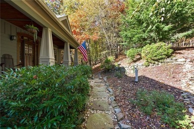 This stunning mountain retreat combines timeless craftsman on Big Canoe Golf Club - Cherokee in Georgia - for sale on GolfHomes.com, golf home, golf lot