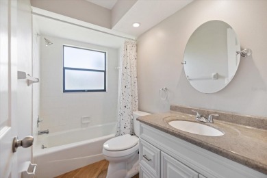 Step inside to discover a masterfully reimagined villa where on IMG Academies Golf and Country Club in Florida - for sale on GolfHomes.com, golf home, golf lot