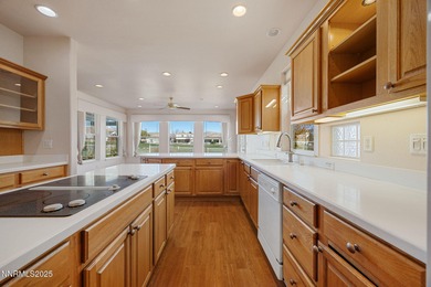 Discover this bright and inviting single-story home tucked along on Silver Oak Golf Course in Nevada - for sale on GolfHomes.com, golf home, golf lot