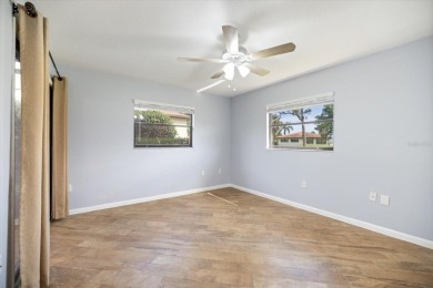 Step inside to discover a masterfully reimagined villa where on IMG Academies Golf and Country Club in Florida - for sale on GolfHomes.com, golf home, golf lot