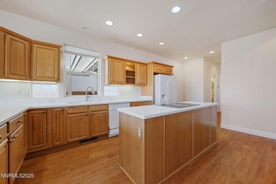 Discover this bright and inviting single-story home tucked along on Silver Oak Golf Course in Nevada - for sale on GolfHomes.com, golf home, golf lot