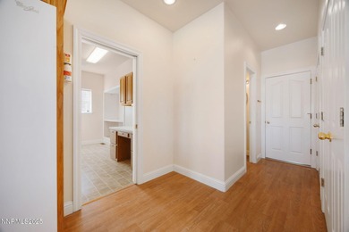 Discover this bright and inviting single-story home tucked along on Silver Oak Golf Course in Nevada - for sale on GolfHomes.com, golf home, golf lot