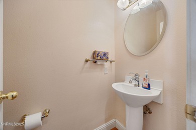 Discover this bright and inviting single-story home tucked along on Silver Oak Golf Course in Nevada - for sale on GolfHomes.com, golf home, golf lot