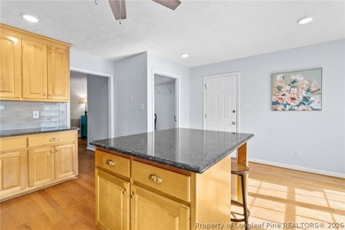 Welcome to this beautifully maintained 3 bedroom, 2 bath home on Cypress Lakes Golf Course in North Carolina - for sale on GolfHomes.com, golf home, golf lot