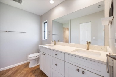 Step inside to discover a masterfully reimagined villa where on IMG Academies Golf and Country Club in Florida - for sale on GolfHomes.com, golf home, golf lot