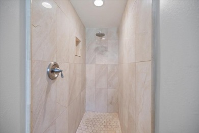 Step inside to discover a masterfully reimagined villa where on IMG Academies Golf and Country Club in Florida - for sale on GolfHomes.com, golf home, golf lot
