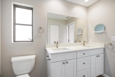Step inside to discover a masterfully reimagined villa where on IMG Academies Golf and Country Club in Florida - for sale on GolfHomes.com, golf home, golf lot