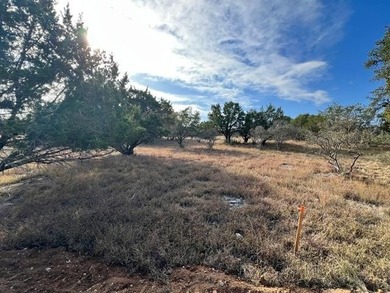 Discover the perfect setting for a refined Hill Country retreat on Slick Rock Golf Course - Horseshoe Bay in Texas - for sale on GolfHomes.com, golf home, golf lot
