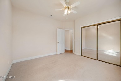 Discover this bright and inviting single-story home tucked along on Silver Oak Golf Course in Nevada - for sale on GolfHomes.com, golf home, golf lot