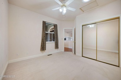 Discover this bright and inviting single-story home tucked along on Silver Oak Golf Course in Nevada - for sale on GolfHomes.com, golf home, golf lot