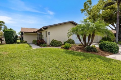 Step inside to discover a masterfully reimagined villa where on IMG Academies Golf and Country Club in Florida - for sale on GolfHomes.com, golf home, golf lot