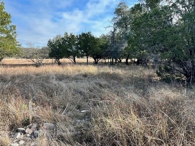 Discover the perfect setting for a refined Hill Country retreat on Slick Rock Golf Course - Horseshoe Bay in Texas - for sale on GolfHomes.com, golf home, golf lot