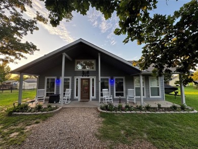 You'll find a wonderful escape from city life in this perfectly on Holly Lake Ranch Golf Club in Texas - for sale on GolfHomes.com, golf home, golf lot