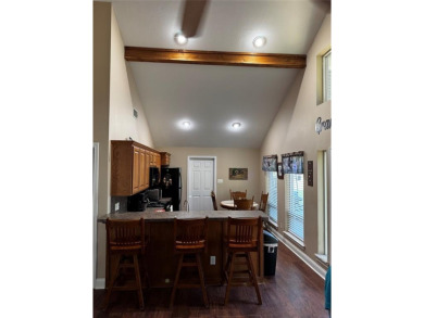 You'll find a wonderful escape from city life in this perfectly on Holly Lake Ranch Golf Club in Texas - for sale on GolfHomes.com, golf home, golf lot