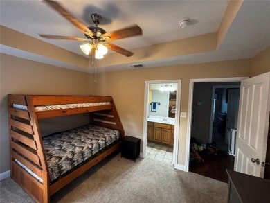 You'll find a wonderful escape from city life in this perfectly on Holly Lake Ranch Golf Club in Texas - for sale on GolfHomes.com, golf home, golf lot