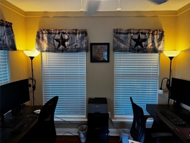 You'll find a wonderful escape from city life in this perfectly on Holly Lake Ranch Golf Club in Texas - for sale on GolfHomes.com, golf home, golf lot