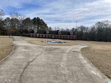 Welcome to your New Haven!!! Situated on a sprawling 13-acre on Pell City Country Club in Alabama - for sale on GolfHomes.com, golf home, golf lot