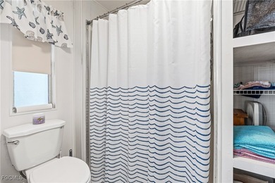 Welcome Home to Tamiami Village 55+! This beautifully maintained on Six Lakes Country Club in Florida - for sale on GolfHomes.com, golf home, golf lot