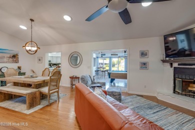 Welcome to 6106 Cutlass Court, a charming brick ranch-style home on Harbour Point Golf Club in North Carolina - for sale on GolfHomes.com, golf home, golf lot