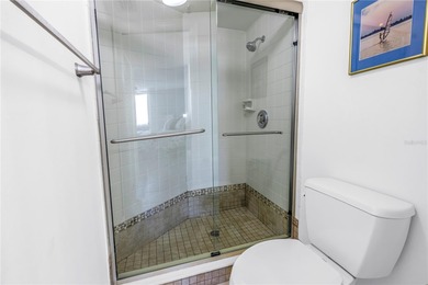 You'll feel instantly at home the moment you step into this on Isla Del Sol Yacht and Country Club in Florida - for sale on GolfHomes.com, golf home, golf lot