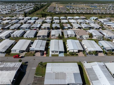 Welcome Home to Tamiami Village 55+! This beautifully maintained on Six Lakes Country Club in Florida - for sale on GolfHomes.com, golf home, golf lot