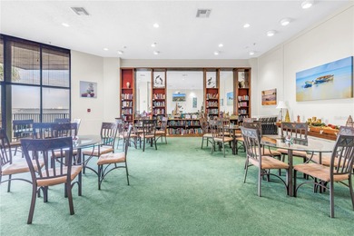 You'll feel instantly at home the moment you step into this on Isla Del Sol Yacht and Country Club in Florida - for sale on GolfHomes.com, golf home, golf lot