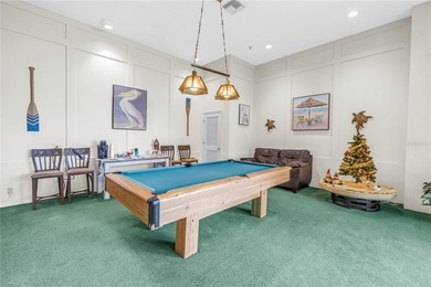 You'll feel instantly at home the moment you step into this on Isla Del Sol Yacht and Country Club in Florida - for sale on GolfHomes.com, golf home, golf lot