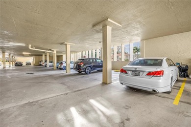 You'll feel instantly at home the moment you step into this on Isla Del Sol Yacht and Country Club in Florida - for sale on GolfHomes.com, golf home, golf lot