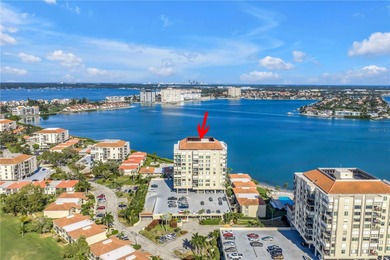You'll feel instantly at home the moment you step into this on Isla Del Sol Yacht and Country Club in Florida - for sale on GolfHomes.com, golf home, golf lot
