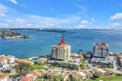 You'll feel instantly at home the moment you step into this on Isla Del Sol Yacht and Country Club in Florida - for sale on GolfHomes.com, golf home, golf lot