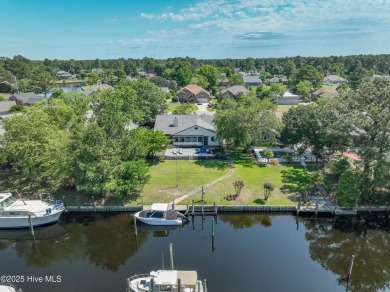 Welcome to 6106 Cutlass Court, a charming brick ranch-style home on Harbour Point Golf Club in North Carolina - for sale on GolfHomes.com, golf home, golf lot