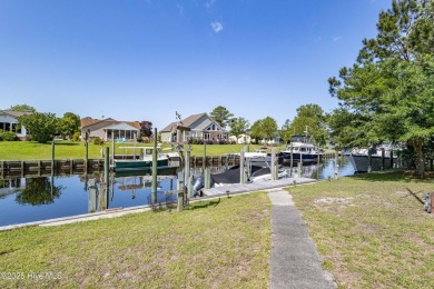 Welcome to 6106 Cutlass Court, a charming brick ranch-style home on Harbour Point Golf Club in North Carolina - for sale on GolfHomes.com, golf home, golf lot