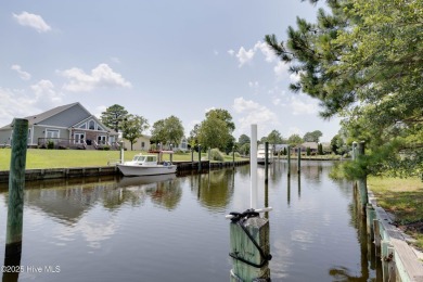 Welcome to 6106 Cutlass Court, a charming brick ranch-style home on Harbour Point Golf Club in North Carolina - for sale on GolfHomes.com, golf home, golf lot
